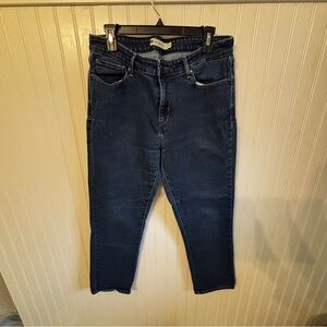 Levi’s mid rise skinny dark denim jeans